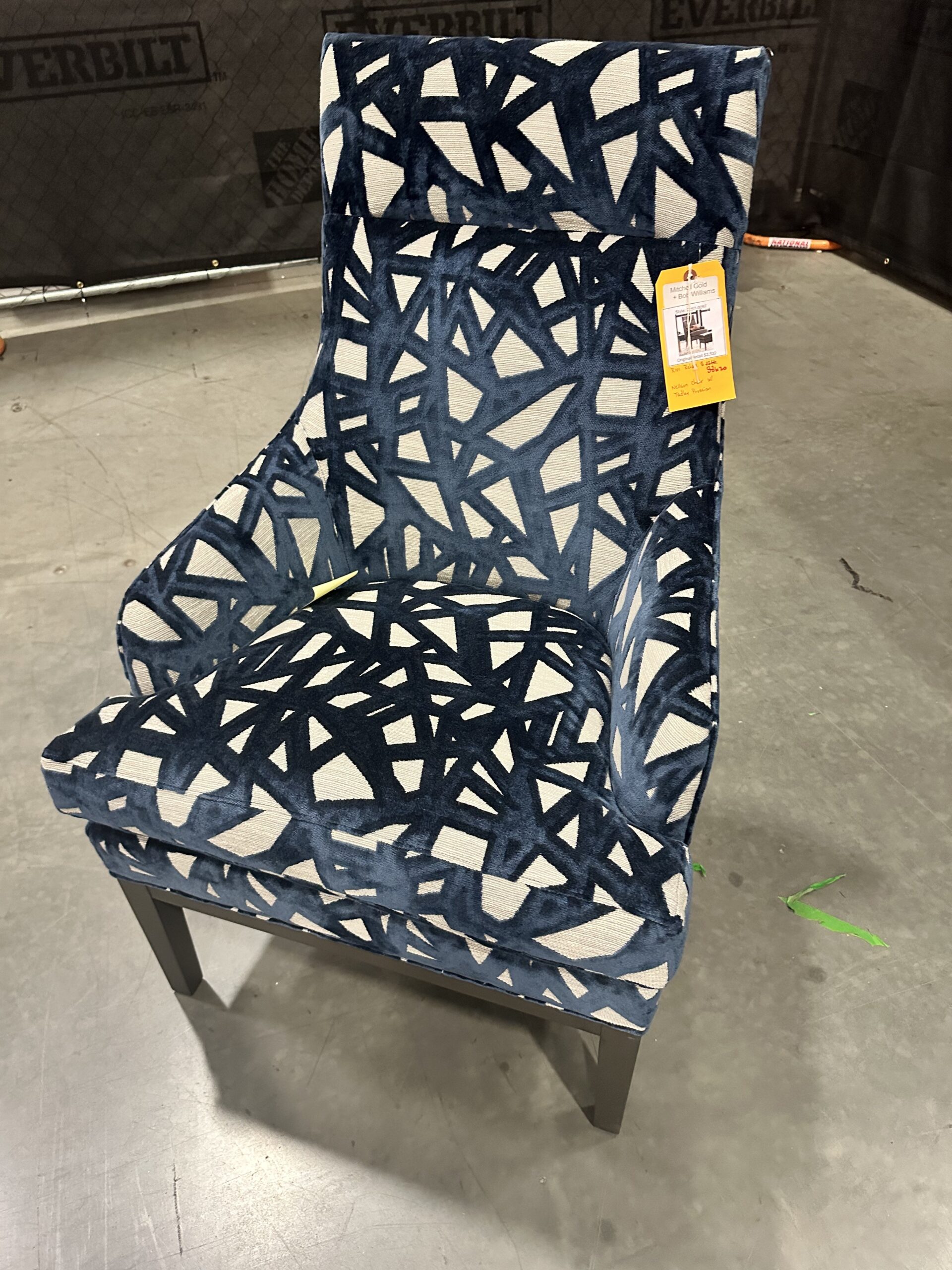 Luxurious Mitchell Gold Bob Williams chair in Tadley Prussian upholstery, perfect for luxury chair liquidation.