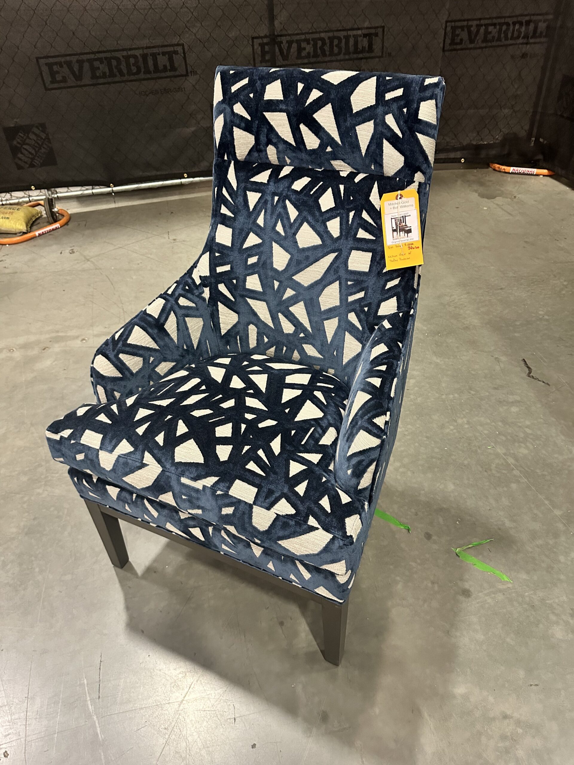 Luxurious Mitchell Gold Bob Williams chair in Tadley Prussian upholstery, perfect for luxury chair liquidation.