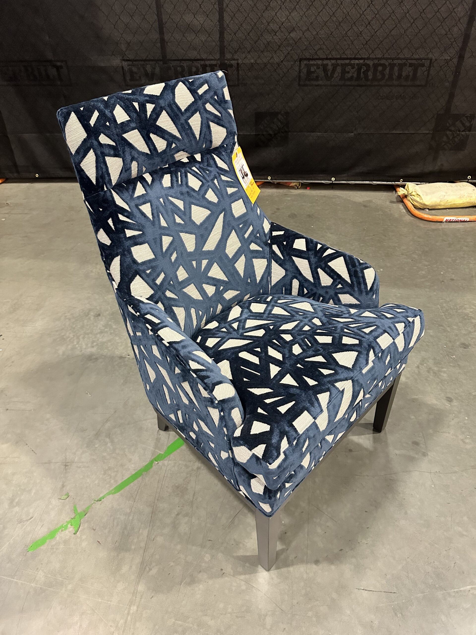 Luxurious Mitchell Gold Bob Williams chair in Tadley Prussian upholstery, perfect for luxury chair liquidation.