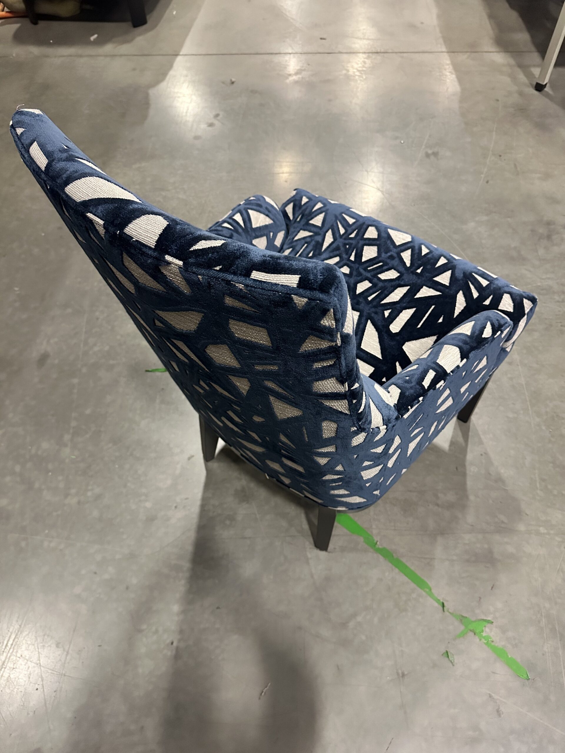 Luxurious Mitchell Gold Bob Williams chair in Tadley Prussian upholstery, perfect for luxury chair liquidation.