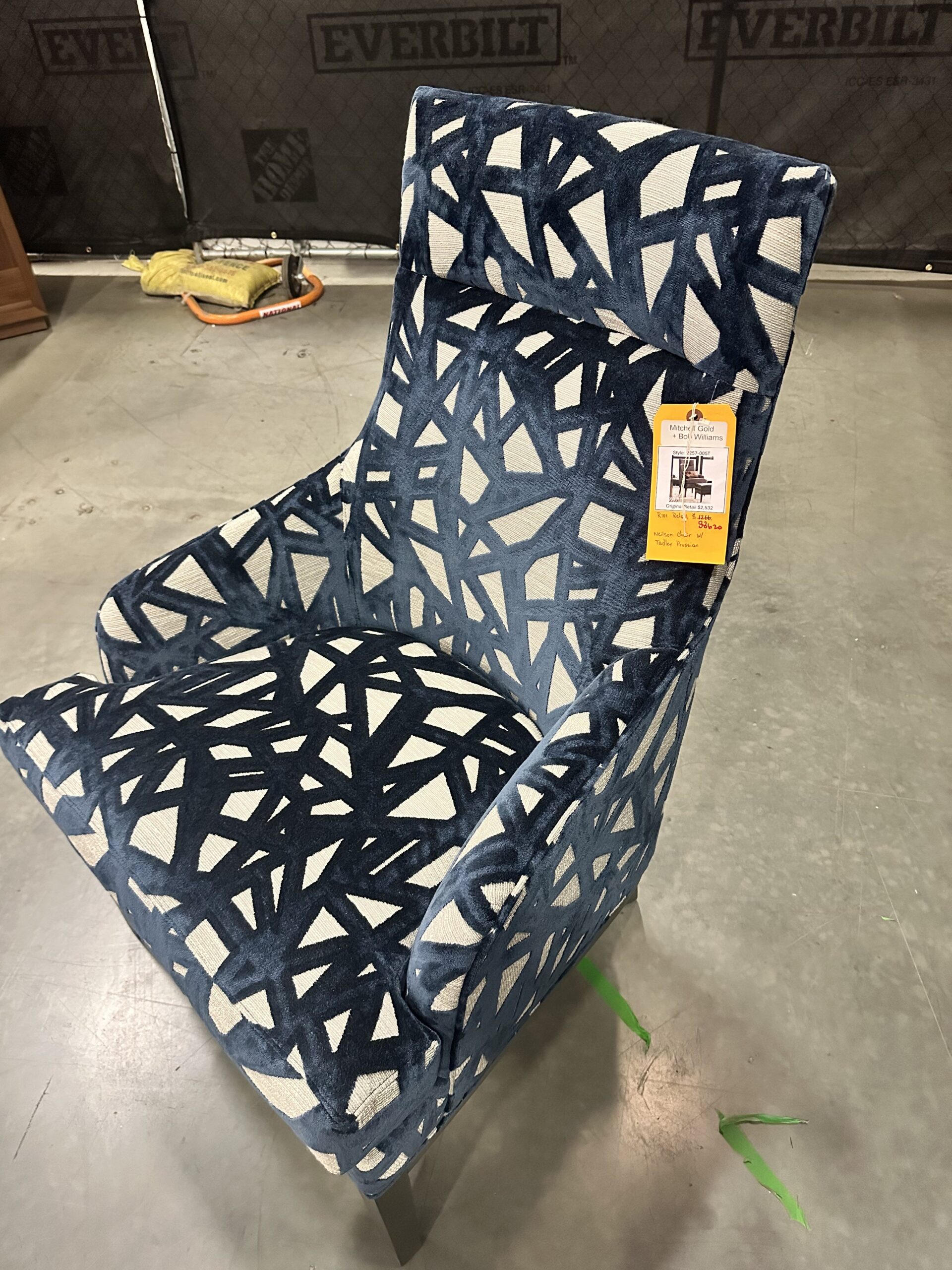 Luxurious Mitchell Gold Bob Williams chair in Tadley Prussian upholstery, perfect for luxury chair liquidation.