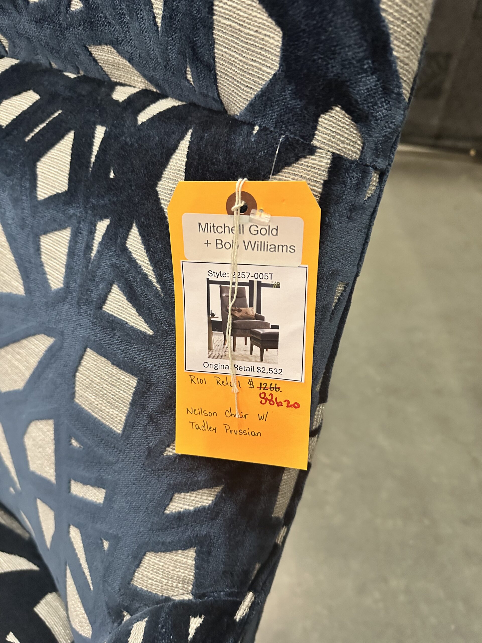 Luxurious Mitchell Gold Bob Williams chair in Tadley Prussian upholstery, perfect for luxury chair liquidation.